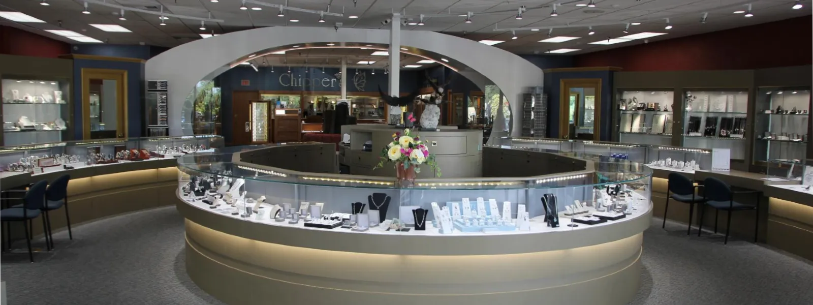 Two men in suits smiling, representing Chipper's Jewelry, a fine jewelry store in Bonney Lake. Click to learn more.