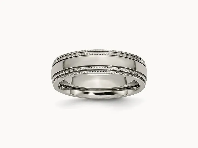 Men's silver wedding band with dual grooves and milgrain detailing.