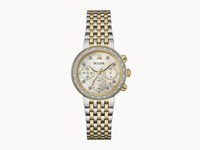 A two-tone Bulova watch with a diamond-accented bezel and chronograph features.