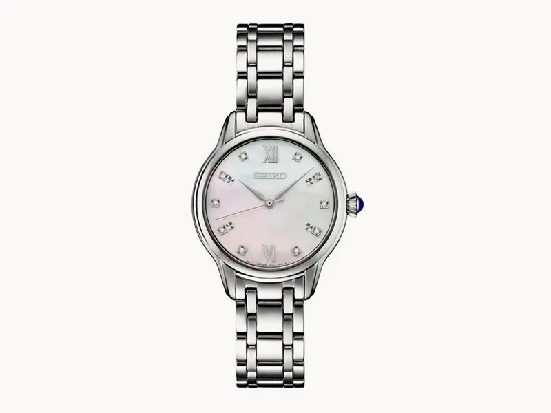 Silver watch with a mother-of-pearl dial, Roman numerals, and diamond hour markers.