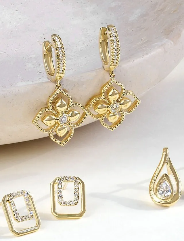 Elegant gold rings from Gabriel & Co.; click to explore more at Dahlkemper's Jewelry Connection in Erie.