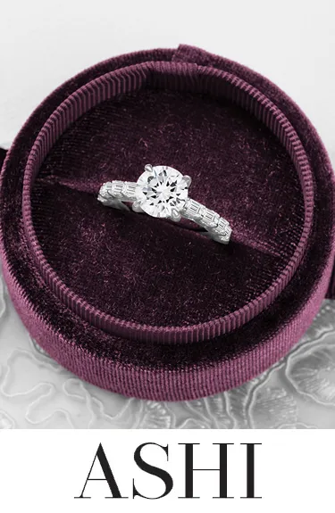 Close-up of an ASHI engagement ring in a velvet box. Click to explore ASHI collections at Dahlkemper's Jewelry Connection.