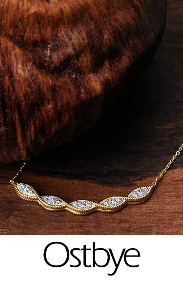 Ostbye jewelry necklace displayed on wood, click to explore more Ostbye designs at Dahlkemper's Jewelry Connection.