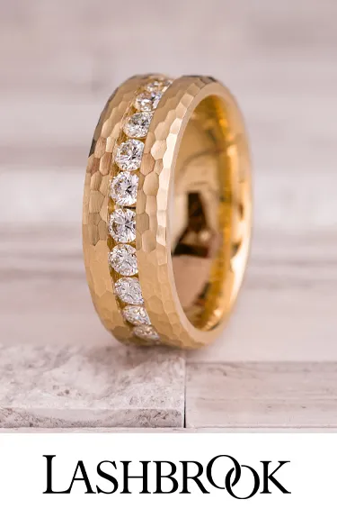 Stylish gold wedding band with diamonds by Lashbrook. Click to explore more at Dahlkemper's Jewelry Connection.