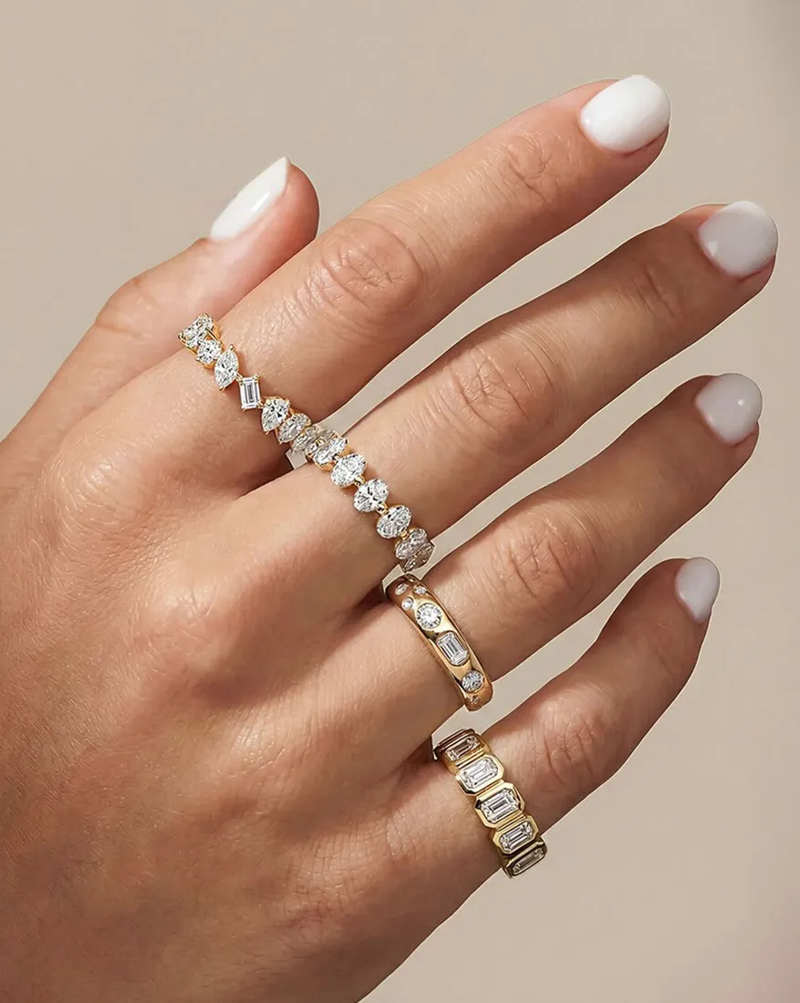 Elegant bridal rings featuring diamonds and gold.