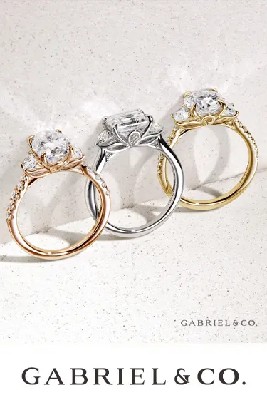 Three elegant engagement rings in rose gold, white gold, and yellow gold by Gabriel & Co. Visit Dahlkemper's Jewelry Connection.