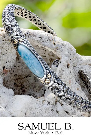Silver bracelet with blue stone and floral design by Samuel B. Click to explore more at Dahlkemper's Jewelry Connection.