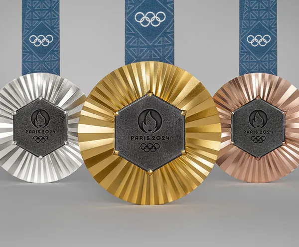 At the Center of Each 2024 Olympic Games Medal Is a Slice of the Eiffel Tower 