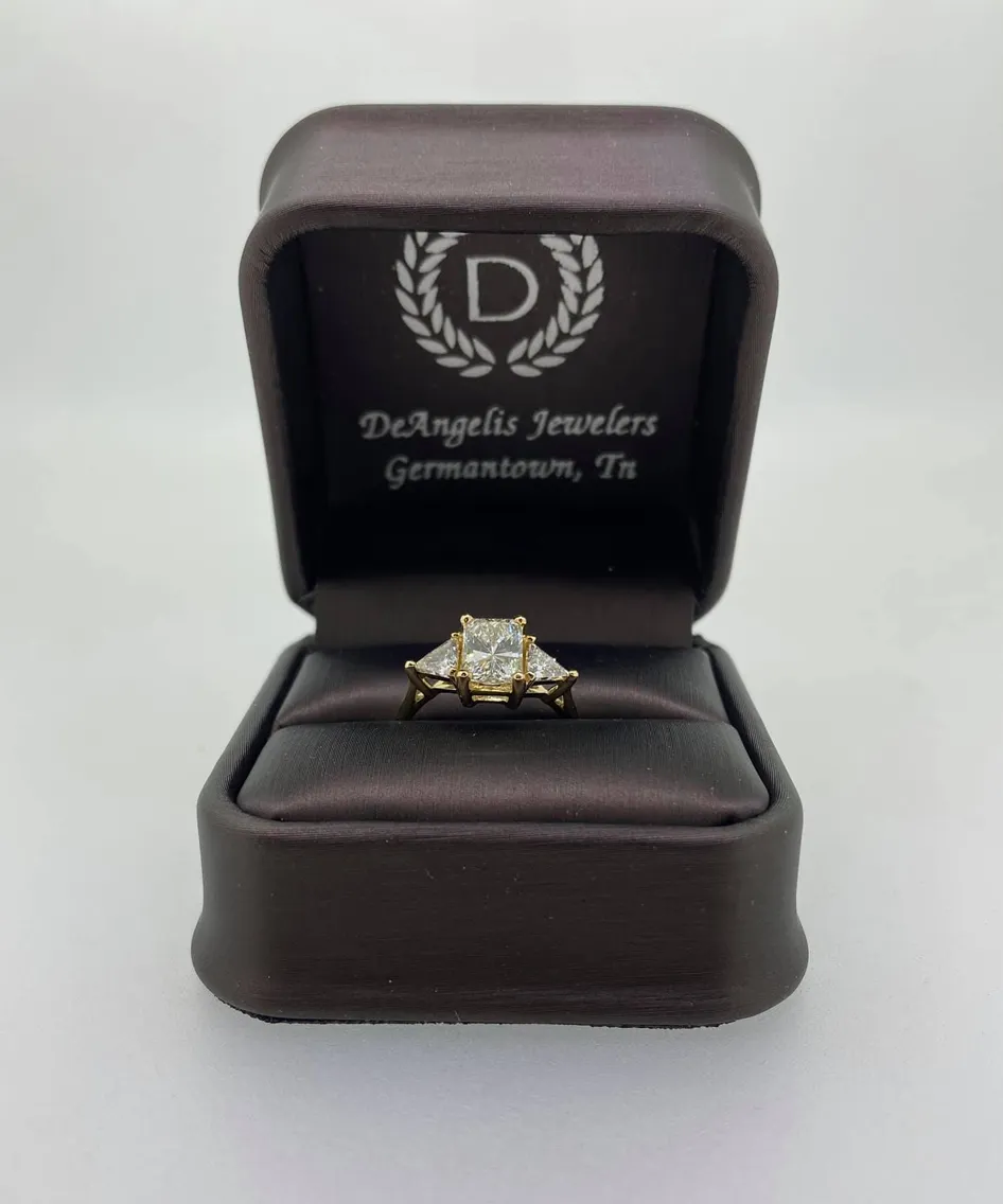 Diamond engagement ring in a brown box from DeAngelis Jewelers, Germantown, TN.