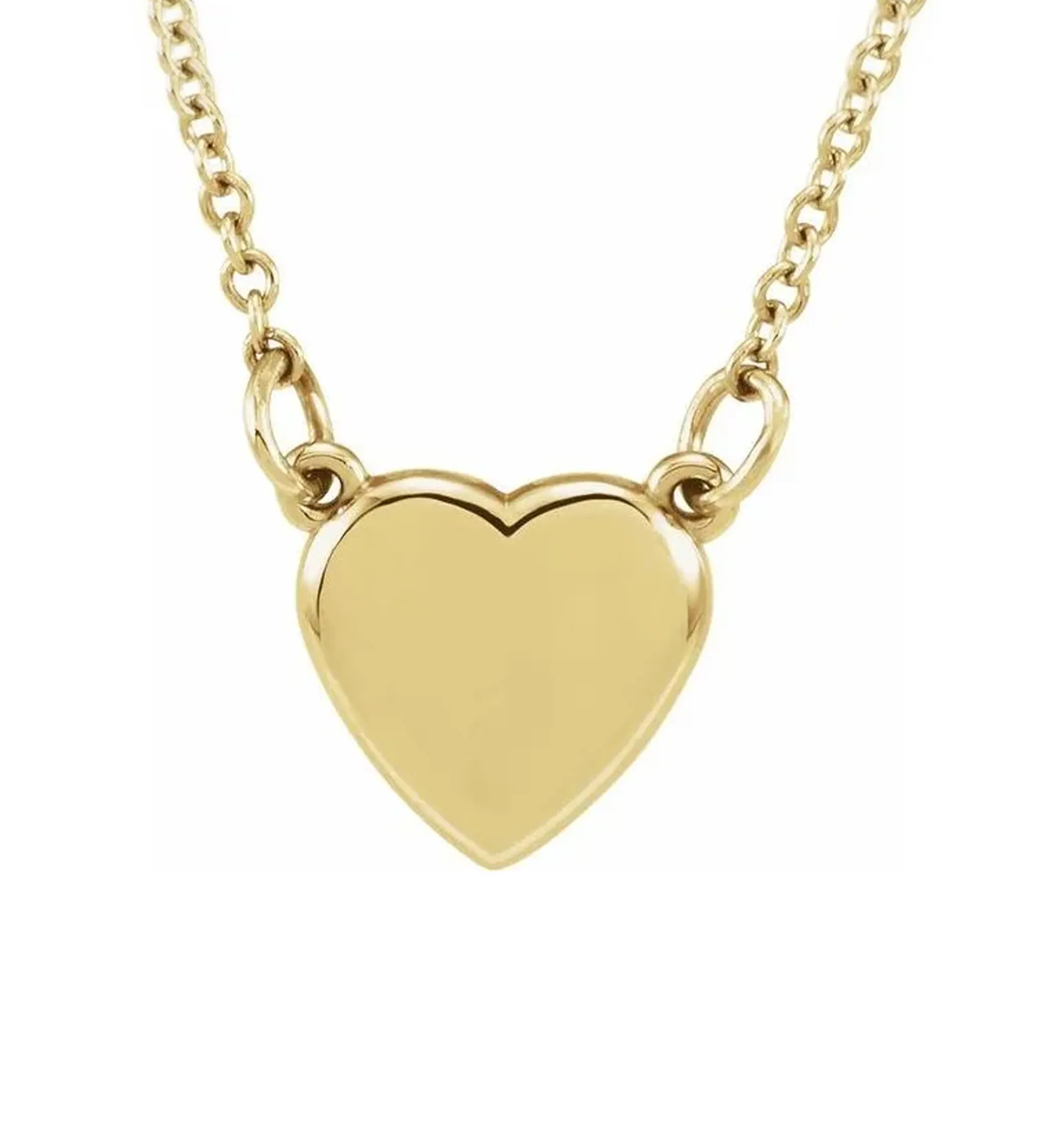 Heart-shaped blue gemstone pendant on a silver chain, worn on a black sweater.