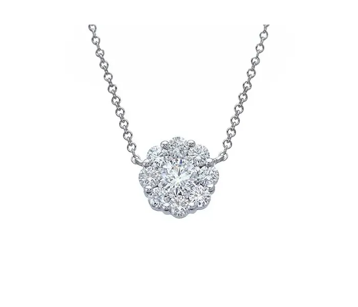 Cluster diamond pendant necklace on a silver chain.