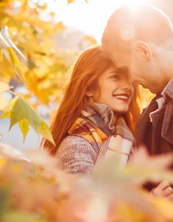 Man and Woman Embracing in Fall