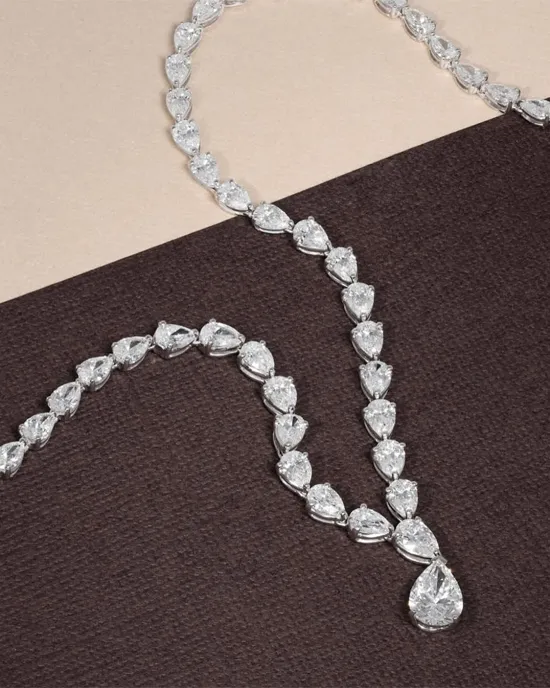 Elegant diamond necklace featuring pear-shaped stones, perfect for special occasions. 