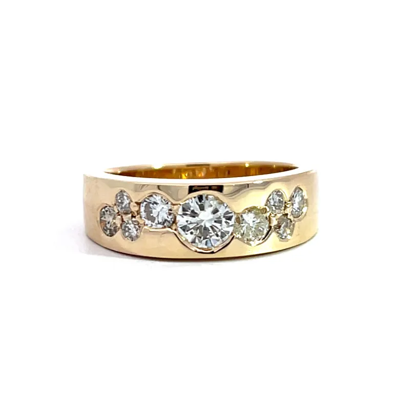 Easy wearing right hand ring using her nine stones.  Diedrich Jewelers Ripon, WI