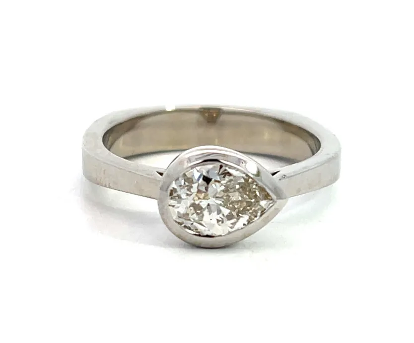 pear diamond set east-west from family pendant  Diedrich Jewelers Ripon, WI