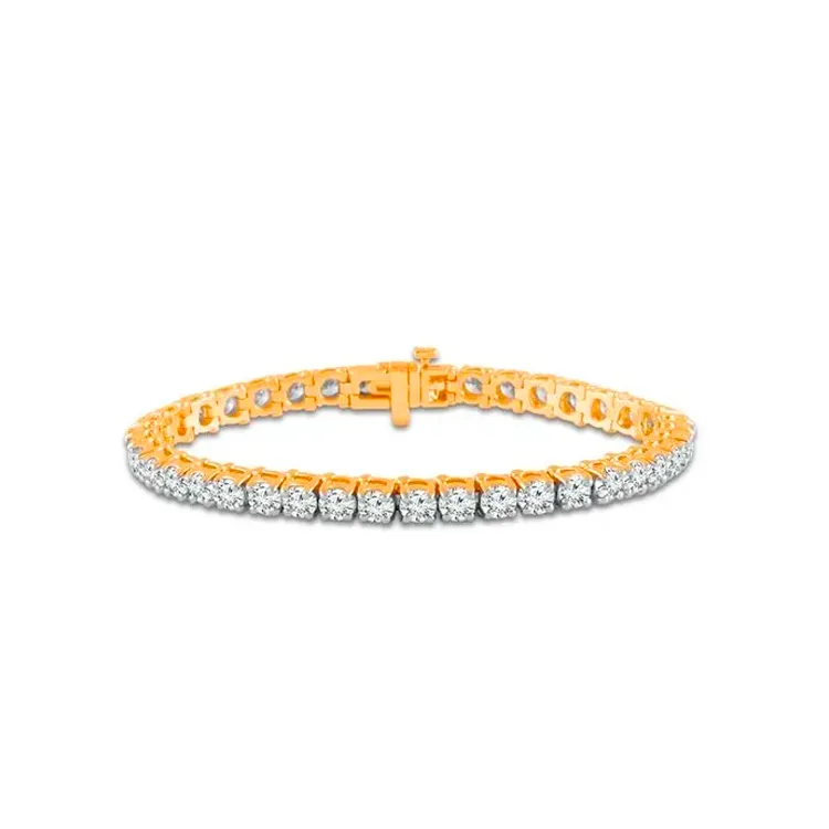 Elegant gold bracelet with sparkling diamonds, perfect for any occasion.