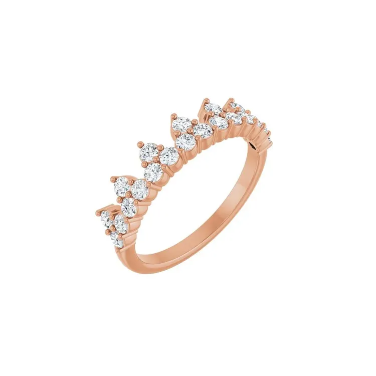 Rose gold crown ring adorned with sparkling diamonds.