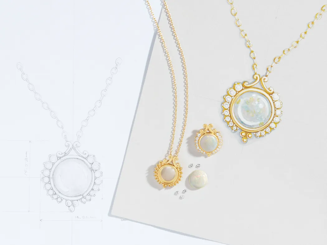Gold jewelry pieces including a necklace and earrings, alongside a design sketch.