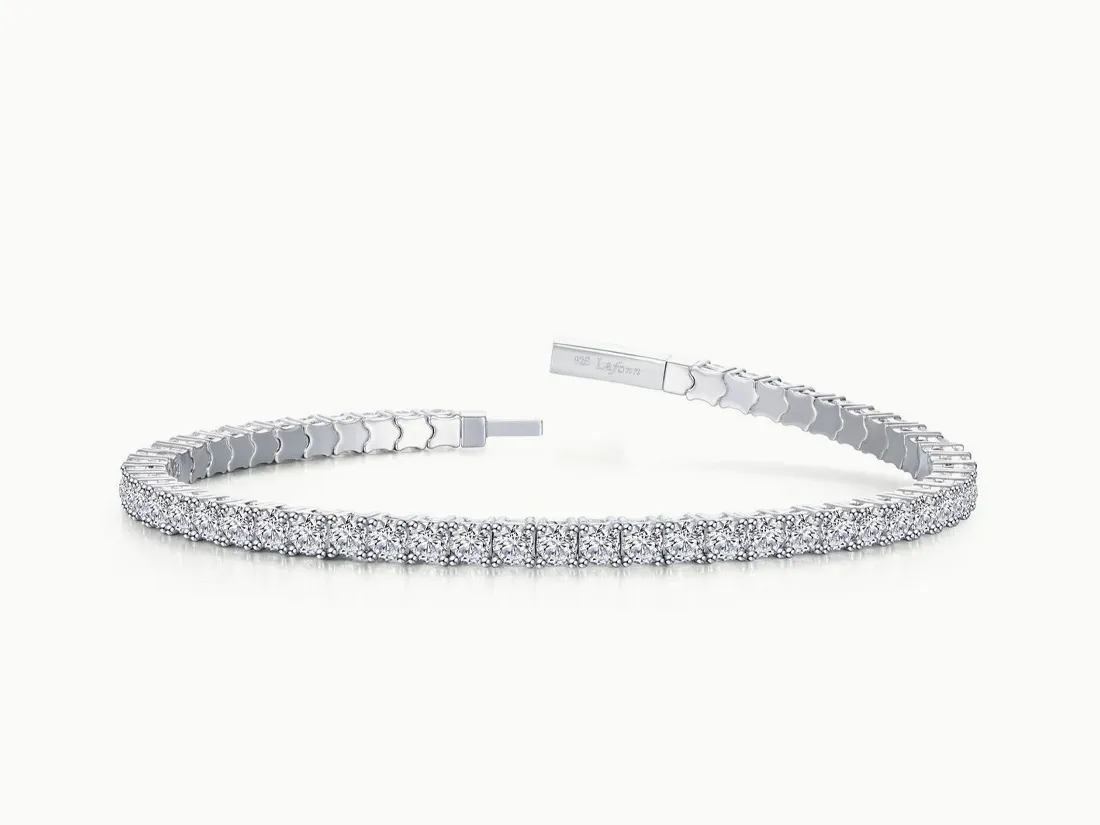 Elegant diamond bracelet on a white background. Click to explore more bracelets at E.G. Landis Jewelers, Inc.