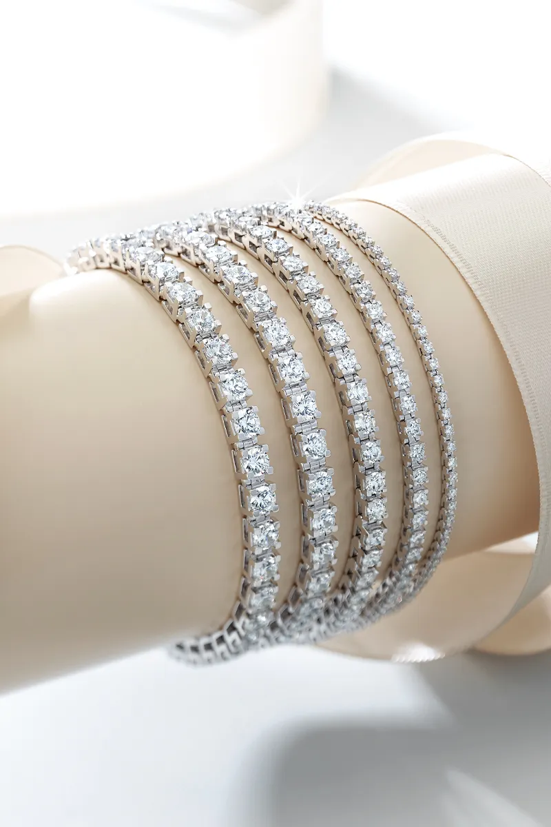 Elegant diamond bracelets displayed on a wrist. Shop at E.G. Landis Jewelers, Gilbertsville.