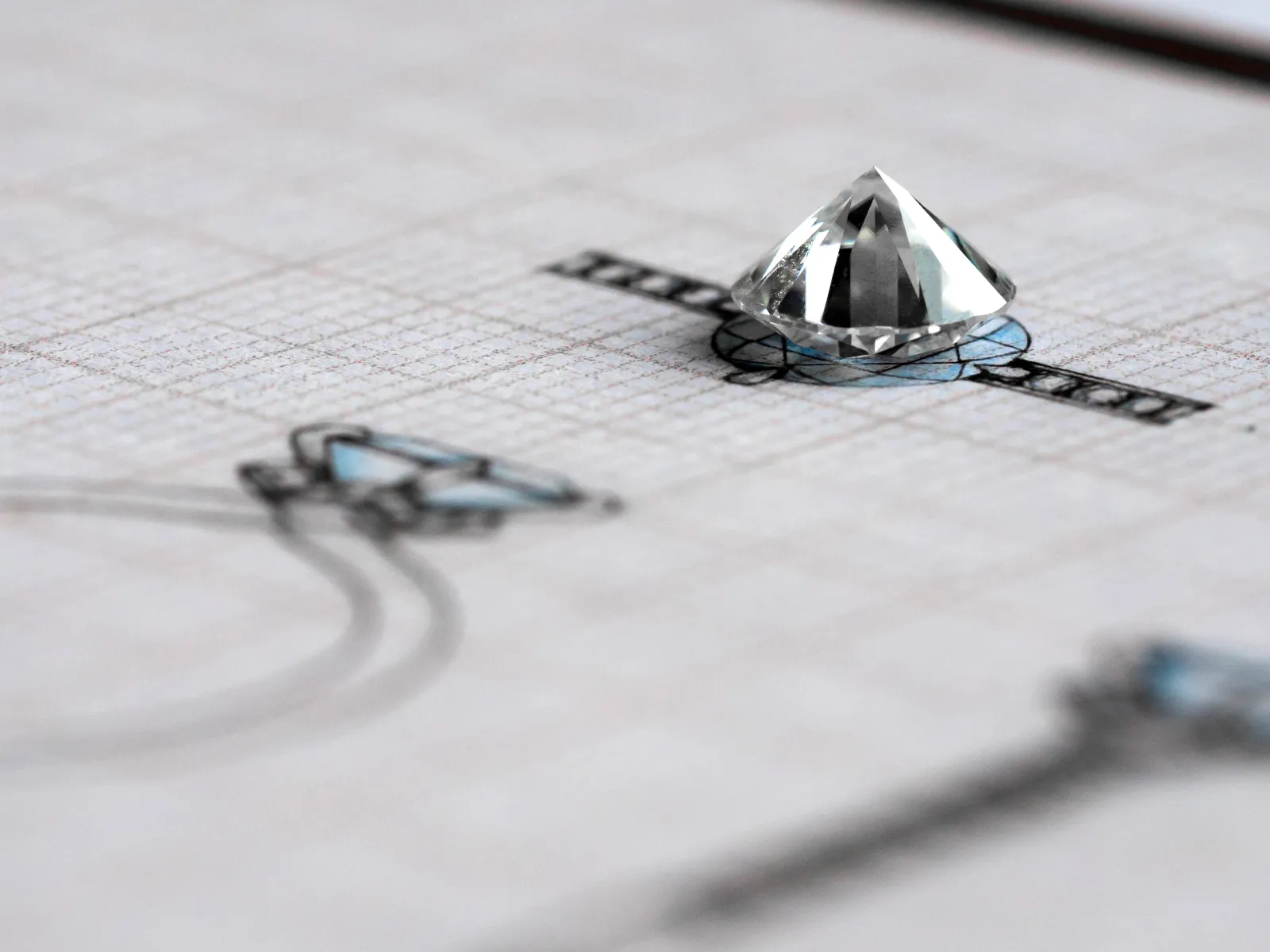 Two elegant rings displayed in hexagonal velvet boxes, featuring a gold band and a diamond engagement ring.