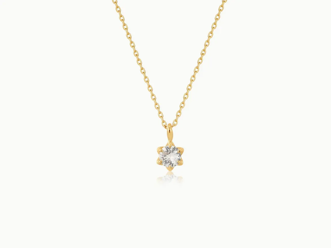 Gold necklace with a star-shaped diamond pendant. Click to explore more necklaces at E.G. Landis Jewelers, Inc.