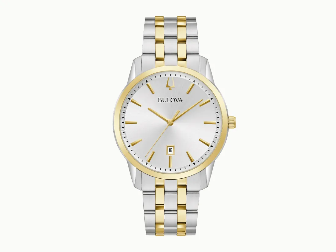 Bulova silver and gold watch with a white dial and date display. Click to explore more watches at E.G. Landis Jewelers.