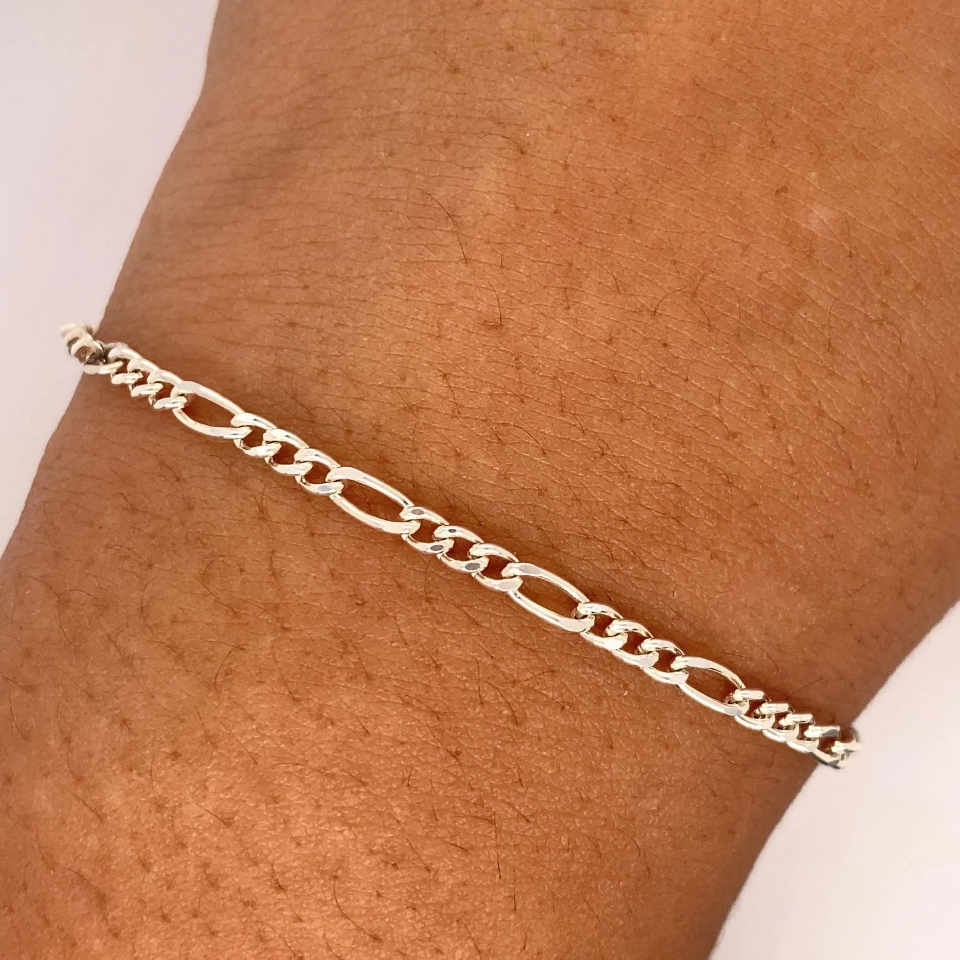 Sterling silver small figaro chain available at Falls Jewelers in Kannapolis, NC and Concord, NC.