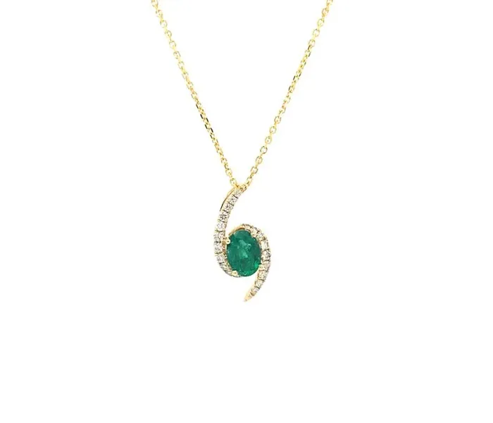 Emerald and diamond pendant necklace in gold, available at Falls Jewelers.