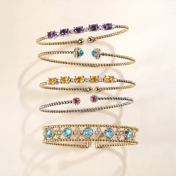 Colored stone bracelets displayed elegantly, available at Falls Jewelers. 