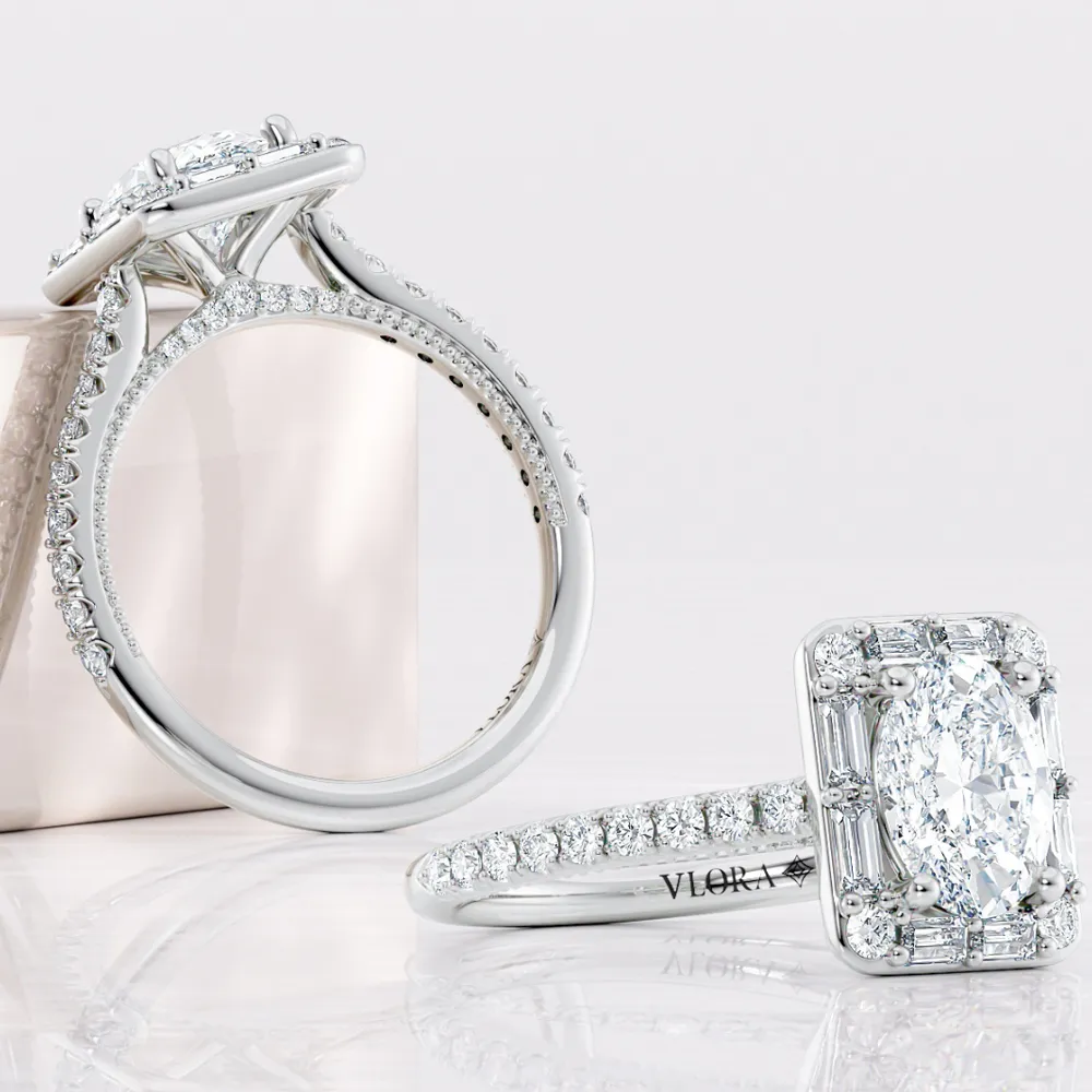 Elegant diamond engagement ring set featuring a marquise-cut center stone and intricate band design.