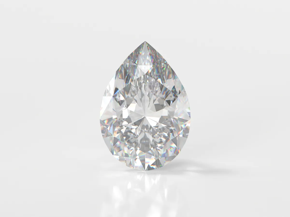 A sparkling pear-shaped diamond on a white background, showcasing its brilliance and clarity.