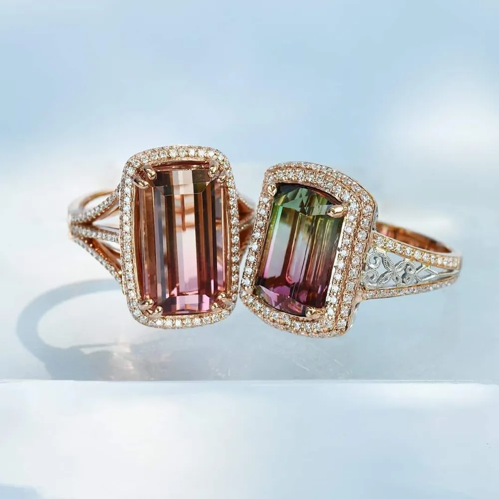 Elegant rose gold rings featuring large tourmaline stones, one pink and one green, surrounded by sparkling diamonds.