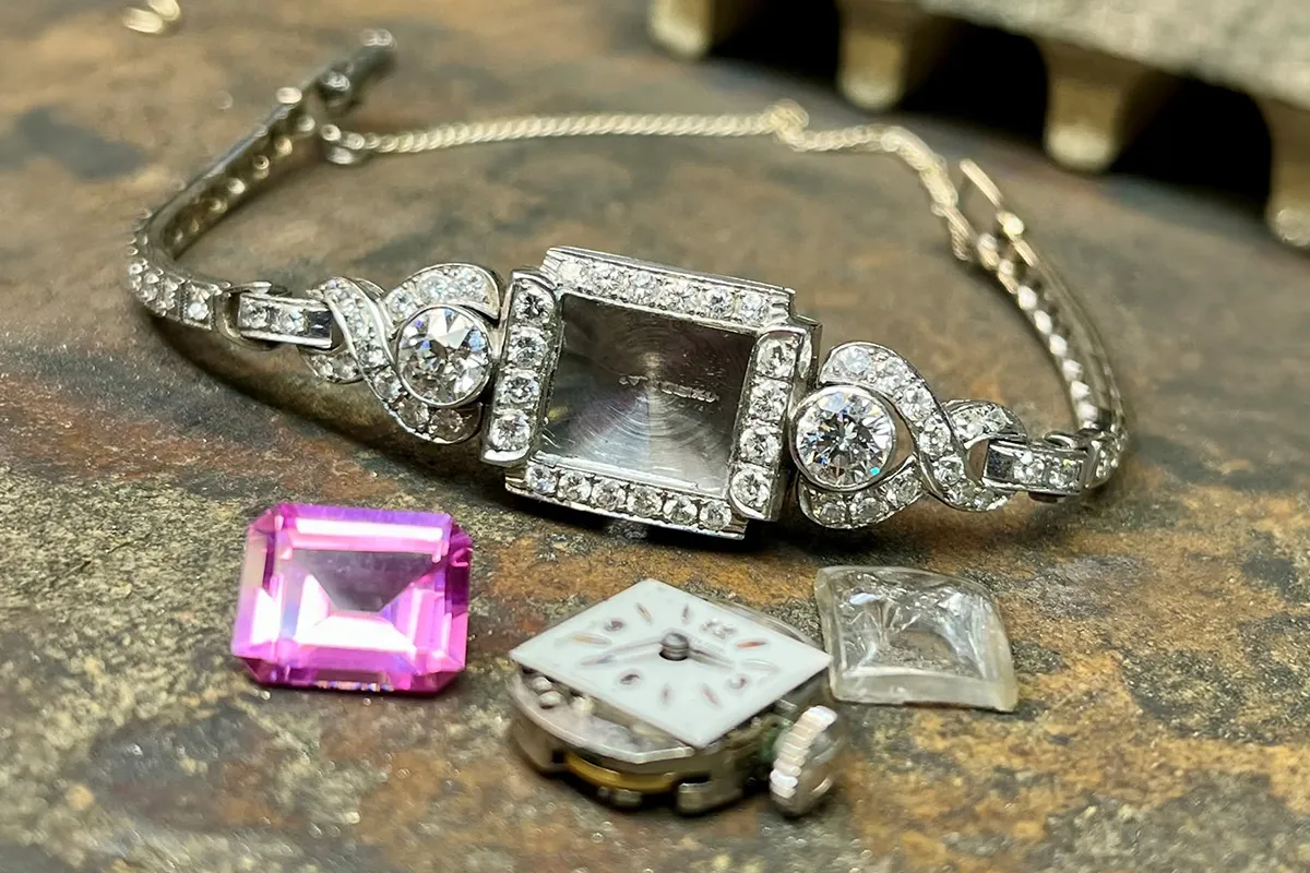 Custom gemstone ring being set by a jeweler at Flora Gems
