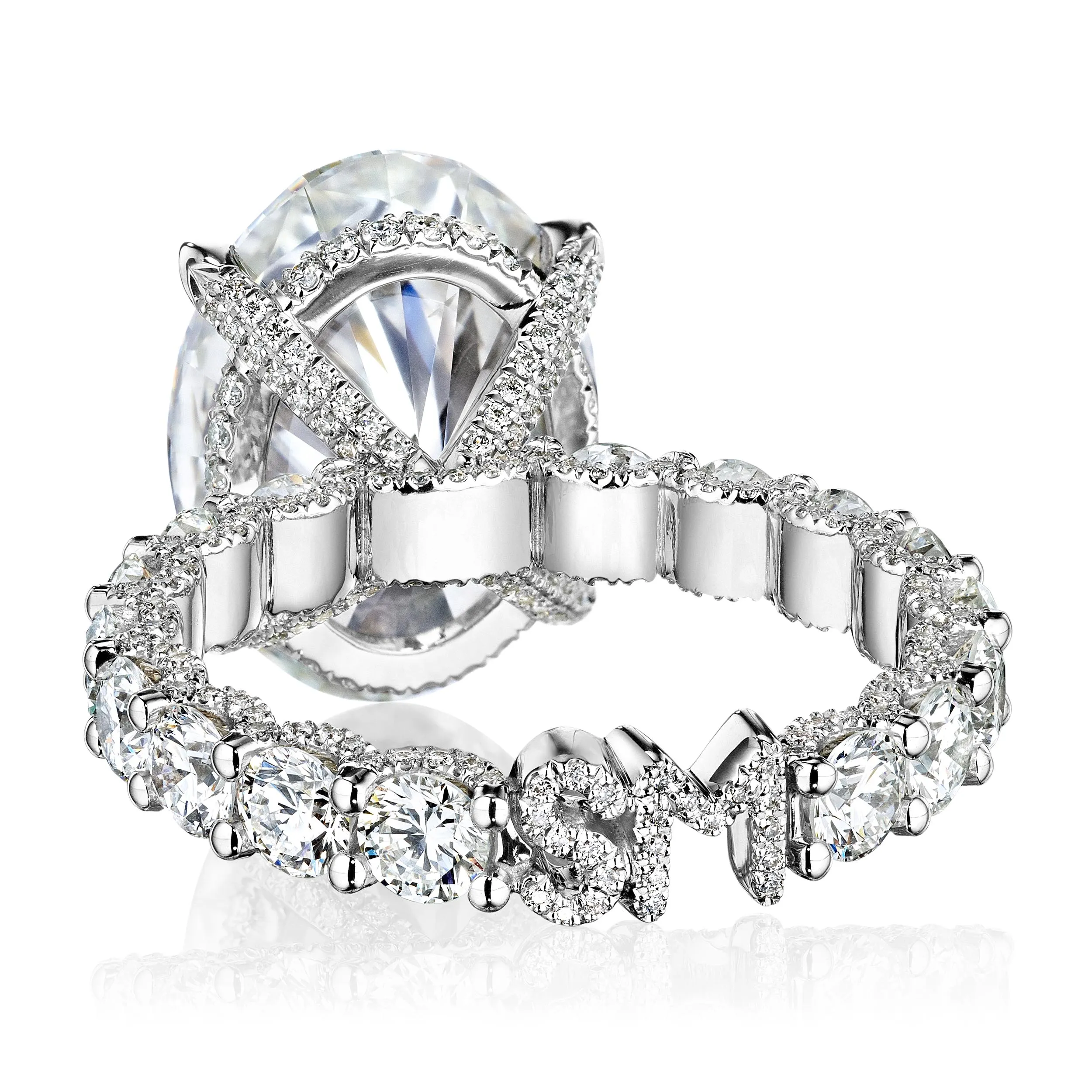 Radiant diamond engagment ring pictured with a radiant halo jacket addon