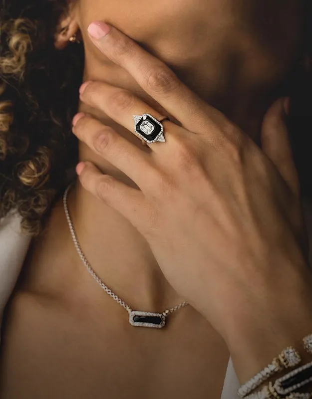 Elegant rings showcased on a woman's hand.
