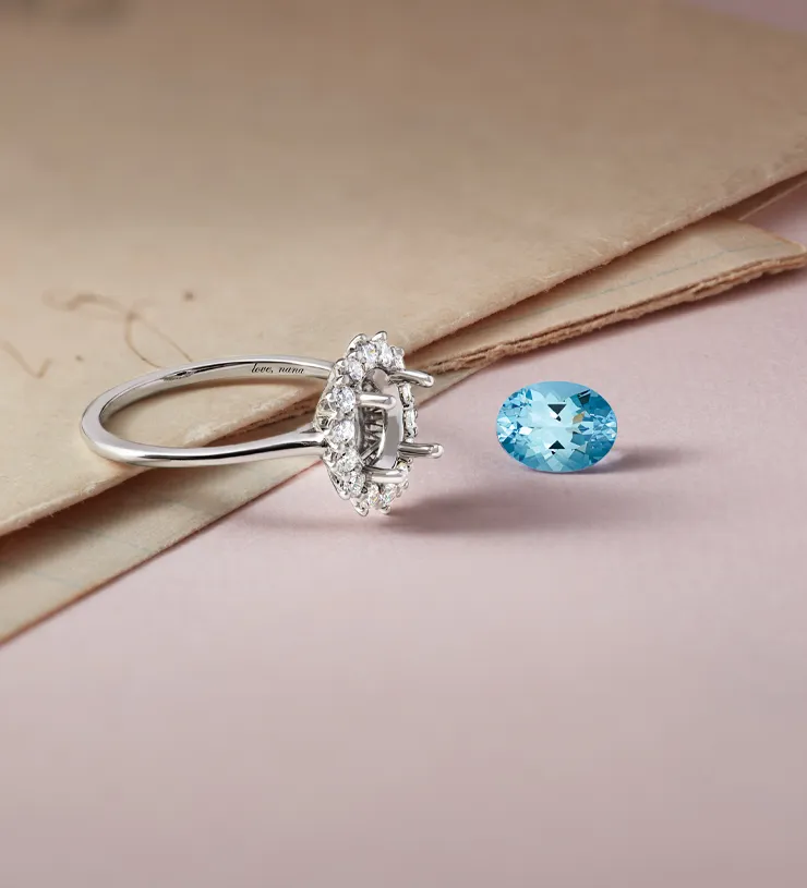 Close-up of green ring settings for custom jewelry design. Click to explore Custom Jewelry Design at Futer Bros Jewelers.