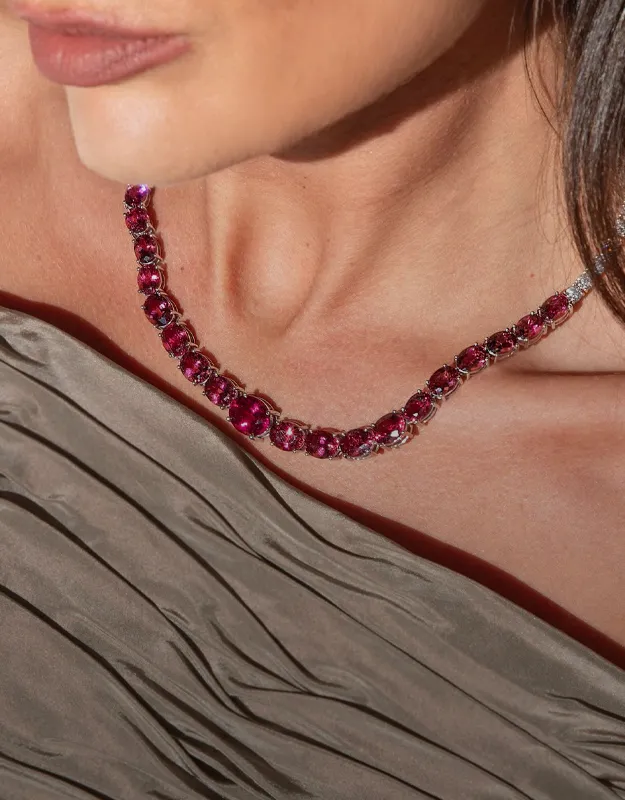 Elegant pink gemstone necklace worn by a model, showcasing fine jewelry from Futer Bros Jewelers. Shop neckwear now!