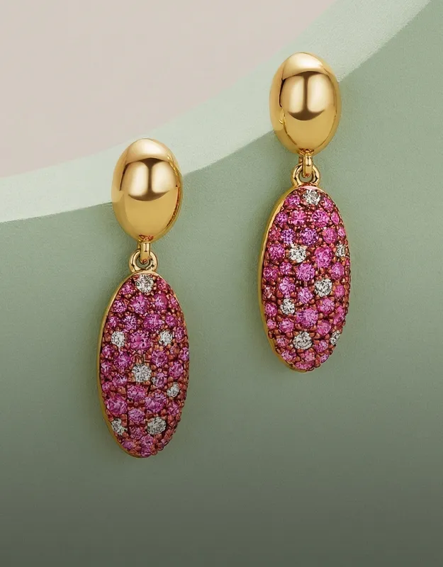 Gold earrings with pink and white gemstones. Click to explore more earrings at Futer Bros Jewelers.