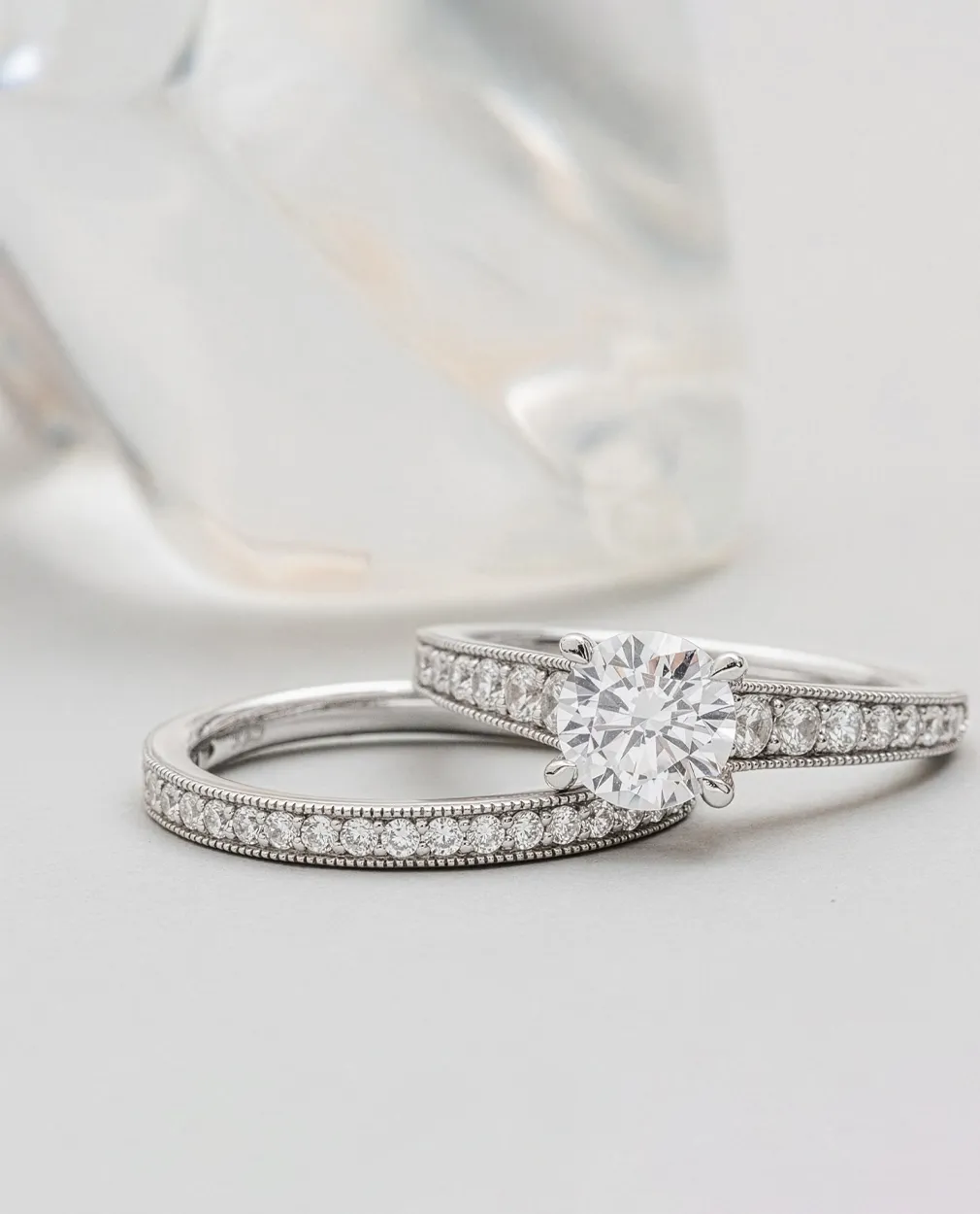 Lab diamond engagement and wedding rings with intricate detailing.