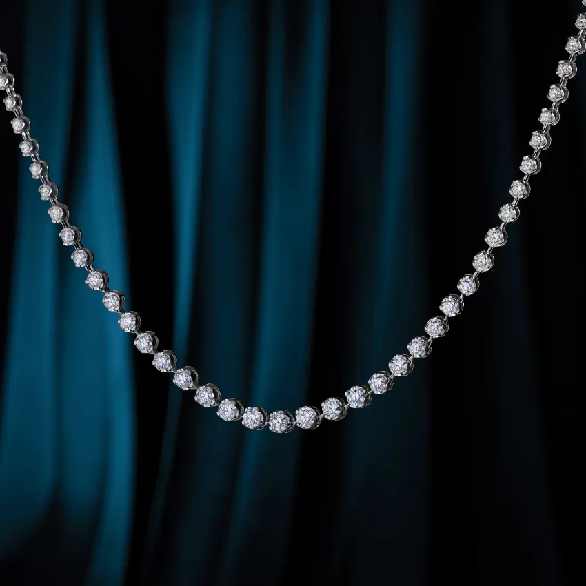 Elegant diamond necklace displayed against a dark blue background.