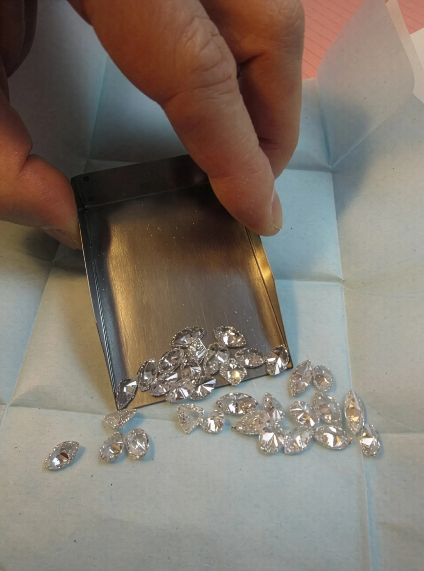 Loose diamonds being sorted and selected in Antwerp