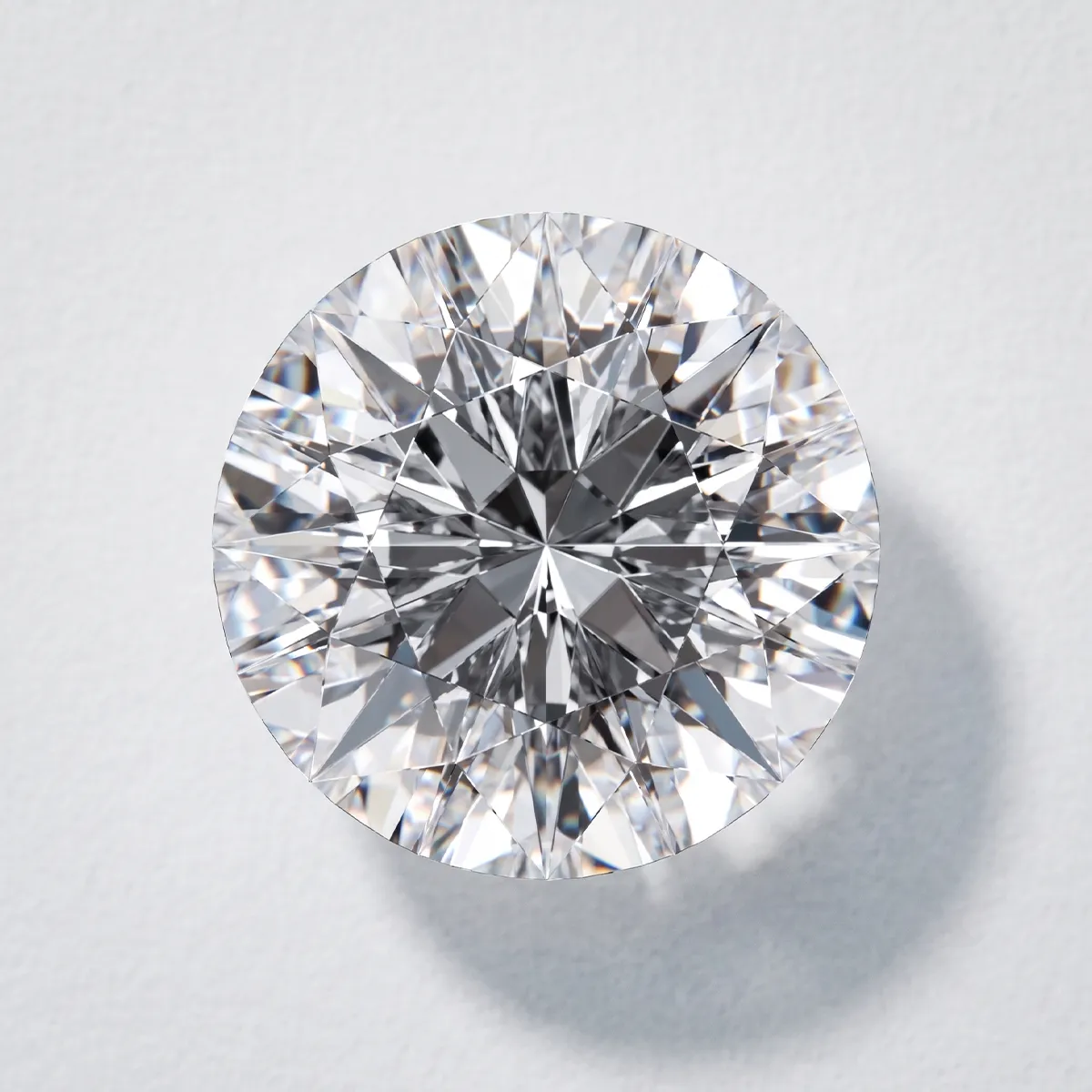 A princess-cut diamond ring with a twisted band on a reflective surface.