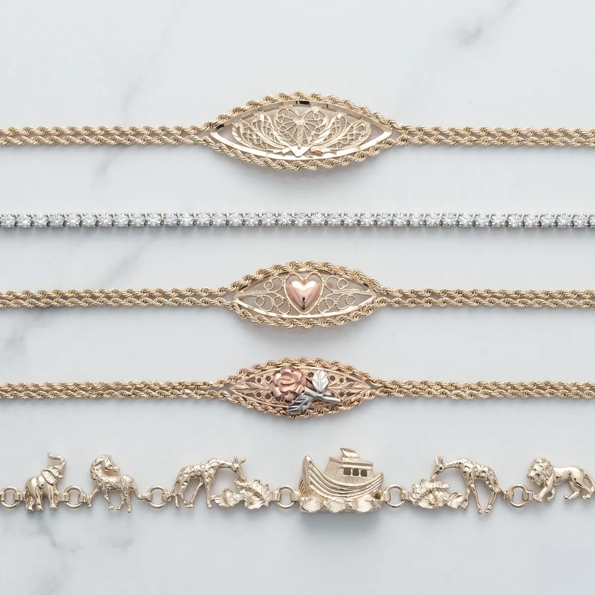 Estate bracelets with intricate designs and animal motifs at Georgetown Jewelers, Wood Dale, IL. Explore estate bracelets.