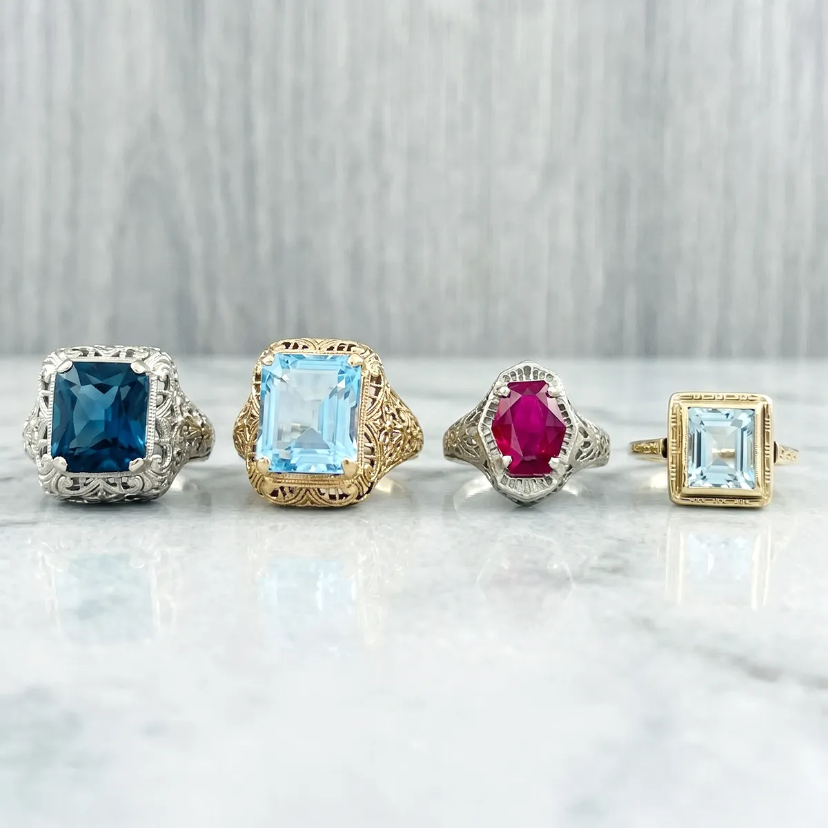 Gemstone rings with intricate designs on display at Georgetown Jewelers, Wood Dale, IL. Learn more about gemstones.