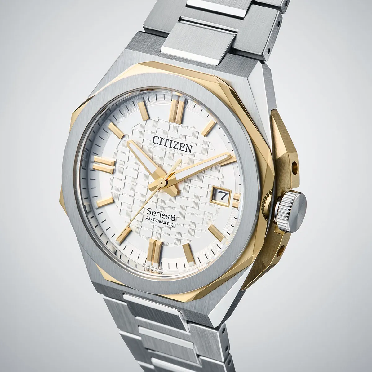 Citizen Series 8 watch with gold accents and date display. Shop watches at Georgetown Jewelers.