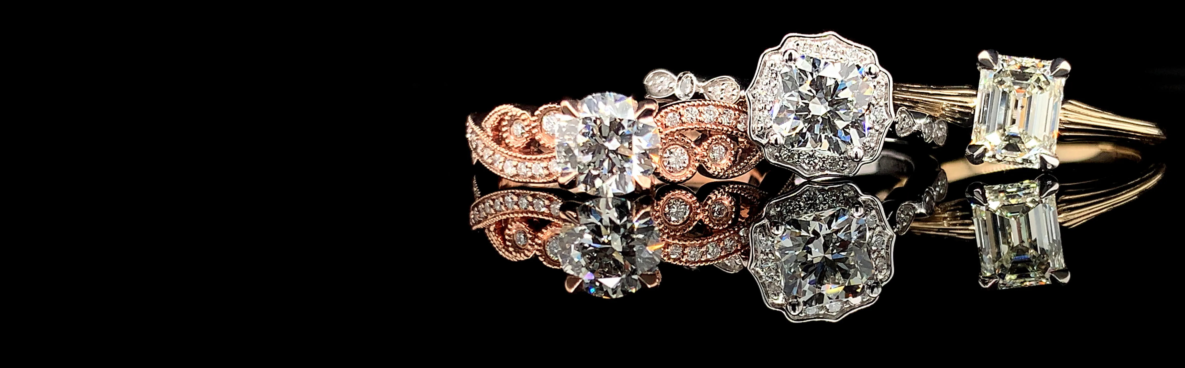 trio of diamond engagement rings