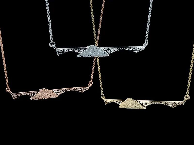 Diamond two stone pendant in yellow gold. Geralds Jewelry Oak Harbor, WA