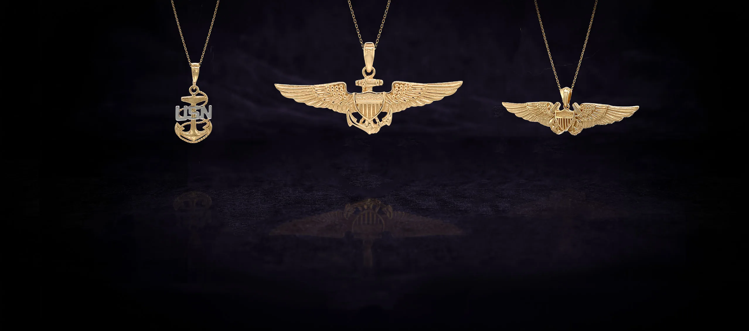Gold military-themed jewelry including pendants and rings on a dark background.