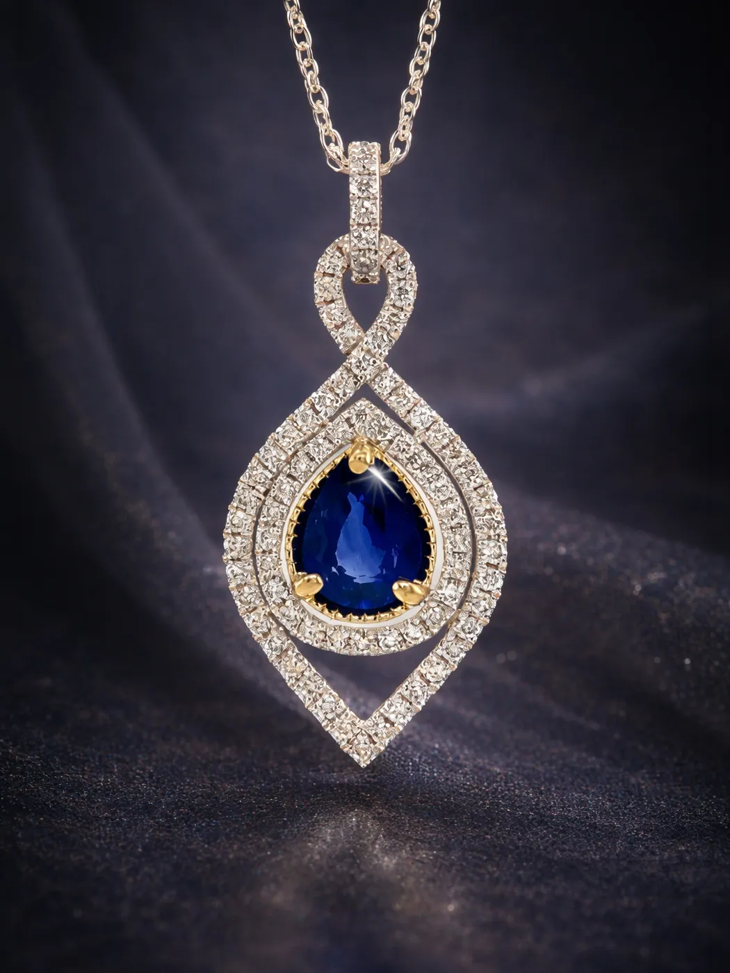 Elegant sapphire and diamond pendant necklace on a dark background.